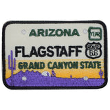 An embroidered Arizona license plate patch featuring text related to Arizona Route 66 and the Grand Canyon, with a cactus design, suitable for iron on application.
