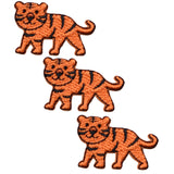 three mini tiger patches on a white background