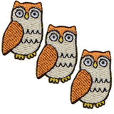 Three embroidered owl patches with iron-on backing.