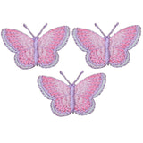 Three pink butterfly applique patches with blue and purple accents, designed to be ironed onto fabric.