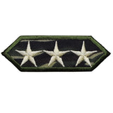 A camouflage patch featuring three white stars on a green, brown, and black patterned background.
