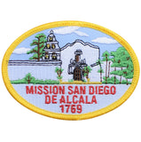 A round embroidered patch featuring a depiction of Mission San Diego de Alcalá with a date '1769' at the bottom, surrounded by a yellow border.