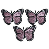 Three pink butterfly applique patches designed for sewing or ironing on clothing or accessories.