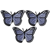 Three light purple butterfly applique patches with black and dark purple details, designed to be ironed onto fabric.