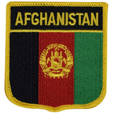 An embroidered patch featuring the flag colors and emblem of Afghanistan, with text that reads 'AFGHANISTAN' on the top part of the patch.