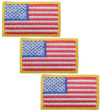 Three small patches with the American flag design, intended to be ironed onto fabric.
