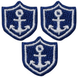 Three embroidered patches featuring a mini anchor design on a blue and white nautical shield, intended for iron-on application.