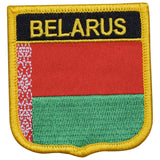 A shield-shaped patch with a red, green, white, and black color scheme, featuring the text 'BELARUS' and the Belarusian flag.