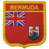 A shield-shaped embroidered patch with red, blue, and yellow colors, featuring the text 'BERMUDA' and the flag of the United Kingdom, along with an emblem.