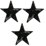 Three black sequin star applique patches with iron on backing, arranged on a white background.