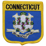 A shield-shaped patch with a blue background and yellow trim with the text 'CONNECTICUT' across the top.