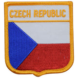 A shield-shaped patch with the flag colors of the Czech Republic and the text 'CZECH REPUBLIC' on it.