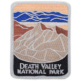 A patch with an embroidered depiction of Death Valley National Park landscape, primarily in brown and blue colors, with text that reads 'DEATH VALLEY NATIONAL PARK'.
