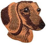 Embroidered patch of a Dachshund on a white background