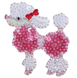 A sequin applique patch featuring a white dog, puppy, in a pink dress badge.