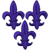 Three purple Fleur De Lis applique patches on a white background