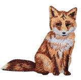 Embroidered patch depicting a brown fox with a white chest and tail, sitting upright.