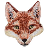 Embroidered patch in the shape of a fox's head with brown, white, and beige colors representing the fur and facial features.