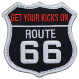 A shield-shaped patch with the text 'GET YOUR KICKS ON ROUTE 66' on a black background with red and white embroidery.