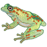 Embroidered patch of a frog with a bright, iridescent light green body and small orange-red spots, positioned on a white background.