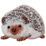 Embroidered patch of a cute hedgehog with a spiky back and brown color scheme.