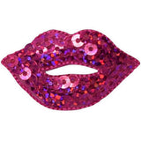 A sequin lip applique patch with fuchsia pink lipstick badge, 1.75 inches in size, designed for iron on application.
