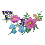 A colorful floral applique patch with a variety of embroidered flowers.