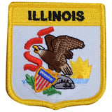 An embroidered patch with the Illinois state emblem, including an eagle, a shield, and text, on a yellow bordered background.
