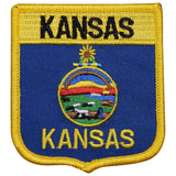 A shield-shaped embroidered patch with the Kansas state emblem and the text 'KANSAS' across the top. 
