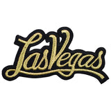 A patch with the text 'Las Vegas' embroidered in gold on a black background.