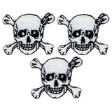 Three embroidered patches featuring a skull and crossbones design on a white background.
