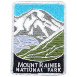 A patch featuring an illustration of Mount Rainier with green hills and blue sky in the background, labeled 'Mount Rainier National Park'.