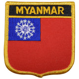 a Myanmar flag patch in the shape of a shield