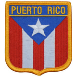A shield-shaped patch with a white star on a blue background, featuring the text 'Puerto Rico' above the star.