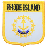 Embroidered patch with 'RHODE ISLAND' text and a state emblem including an anchor and stars, bordered by a yellow stitch, designed as an iron-on application.