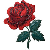 red rose patch with green leaves and stem, and shimmery threads