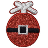 A round red sparkly ornament patch featuring a white bow and black belt.