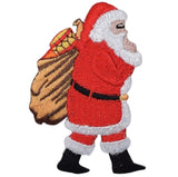Embroidered patch of Santa Claus carrying a bag of toys, designed for iron on application.
