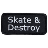 Black embroidered patch with the white text 'Skate & Destroy' in a simple sans-serif font.