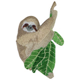 Embroidered applique patch of a sloth hanging on a branch with green leaves.