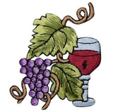 A embroidered patch featuring a glass of red wine with grapes and green leaves.
