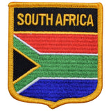an embroidered patch of the South Africa flag in the shape of a shield