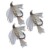 Three embroidered patches depicting gold ribbed hare's ear fly fishing lures, arranged side by side against a white background.